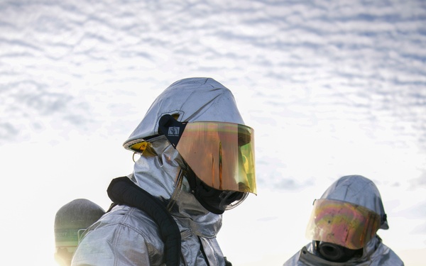 Sailors Participate In a Firefighting Drill