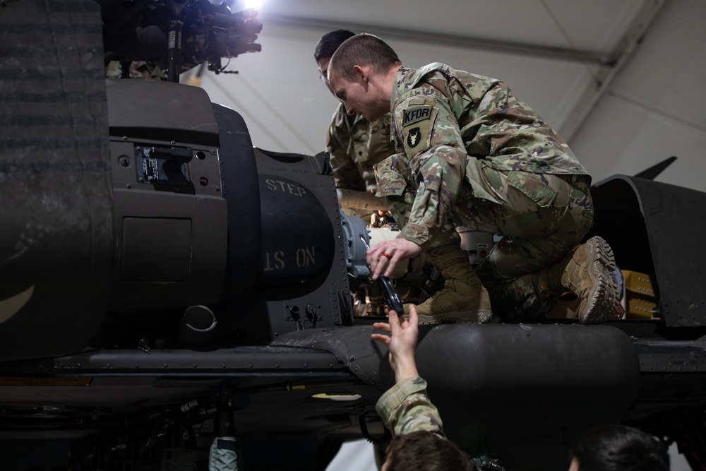 KFOR's Task Force Aviation perform repairs on UH-60M Black Hawk Helicopter