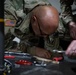 KFOR's Task Force Aviation perform repairs on UH-60M Black Hawk Helicopter