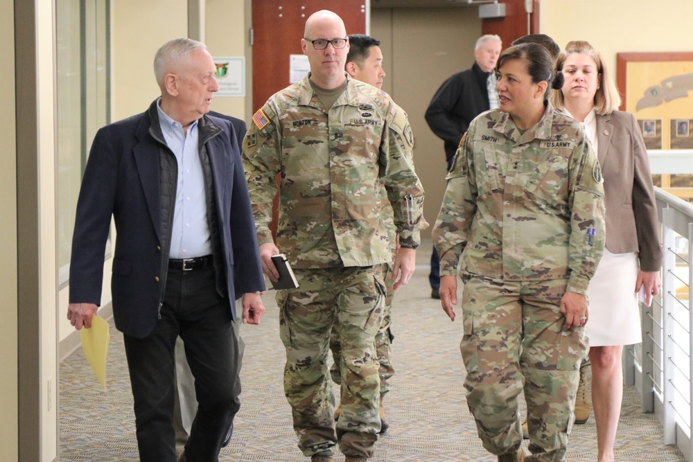 Former Secretary of Defense James Mattis met with servicemembers from the 63d Readiness Division