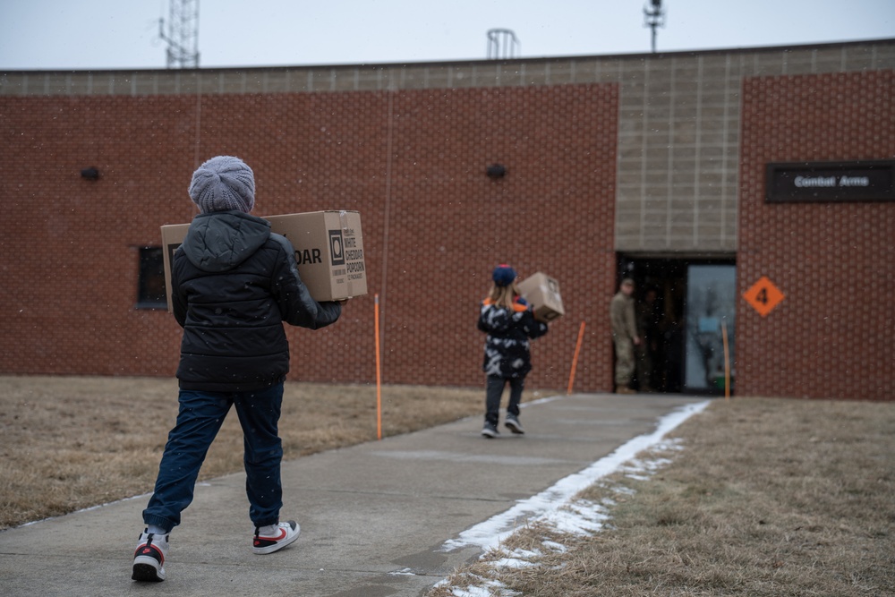 Cub Scouts deliver popcorn to 114th Fighter Wing