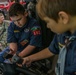 Cub Scouts deliver popcorn to 114th Fighter Wing