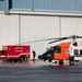 Coast Guard helicopter crew rescues two survivors from capsized vessel