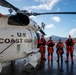 Coast Guard helicopter crew rescues two survivors from capsized vessel