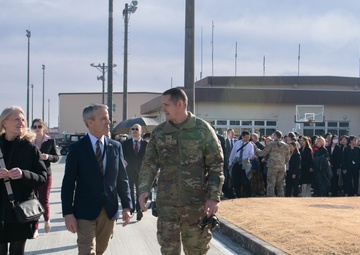 DFAS personnel walk the flightline