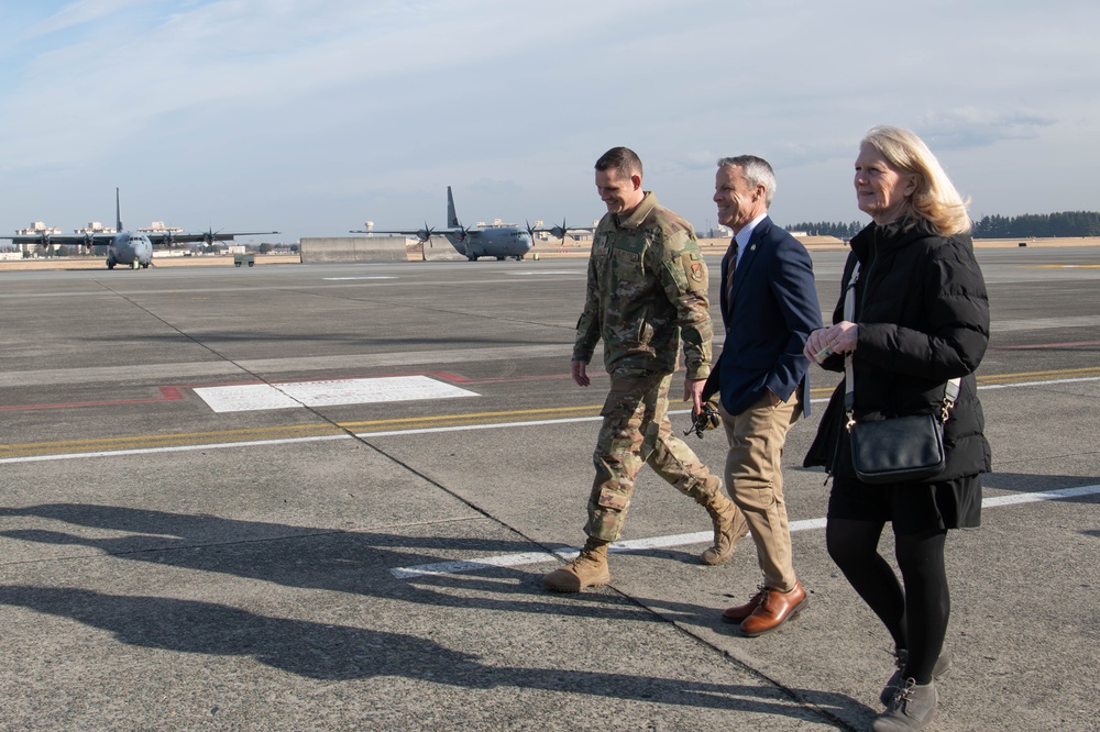 DFAS personnel walk the flightline