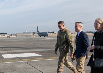 DFAS personnel walk the flightline