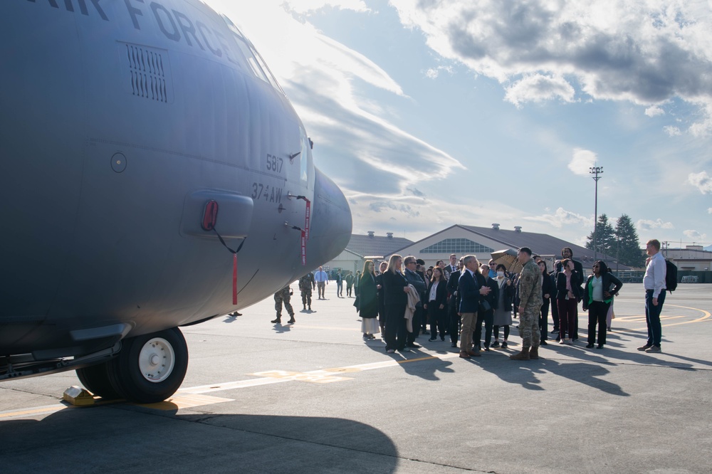 DFAS personnel walk the flightline