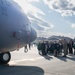 DFAS personnel walk the flightline