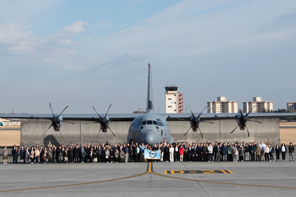 DFAS personnel walk the flightline