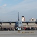 DFAS personnel walk the flightline