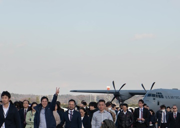 DFAS personnel walk the flightline