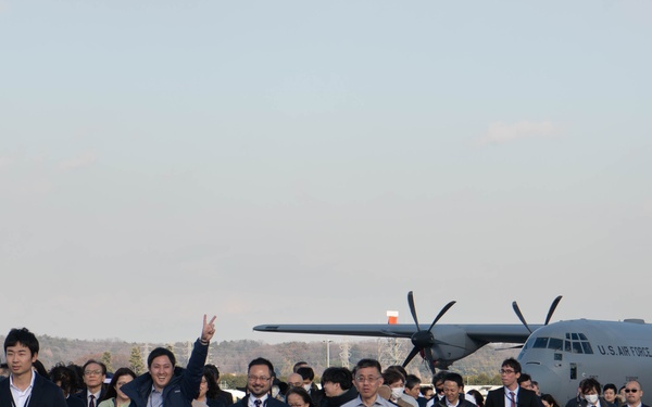 DFAS personnel walk the flightline
