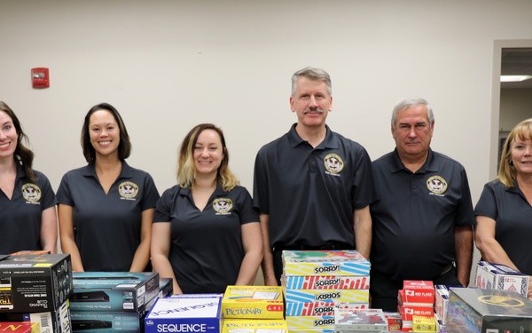 Military Sealift Command Resiliency Team Delivers Crew Care Package to USNS William McLean