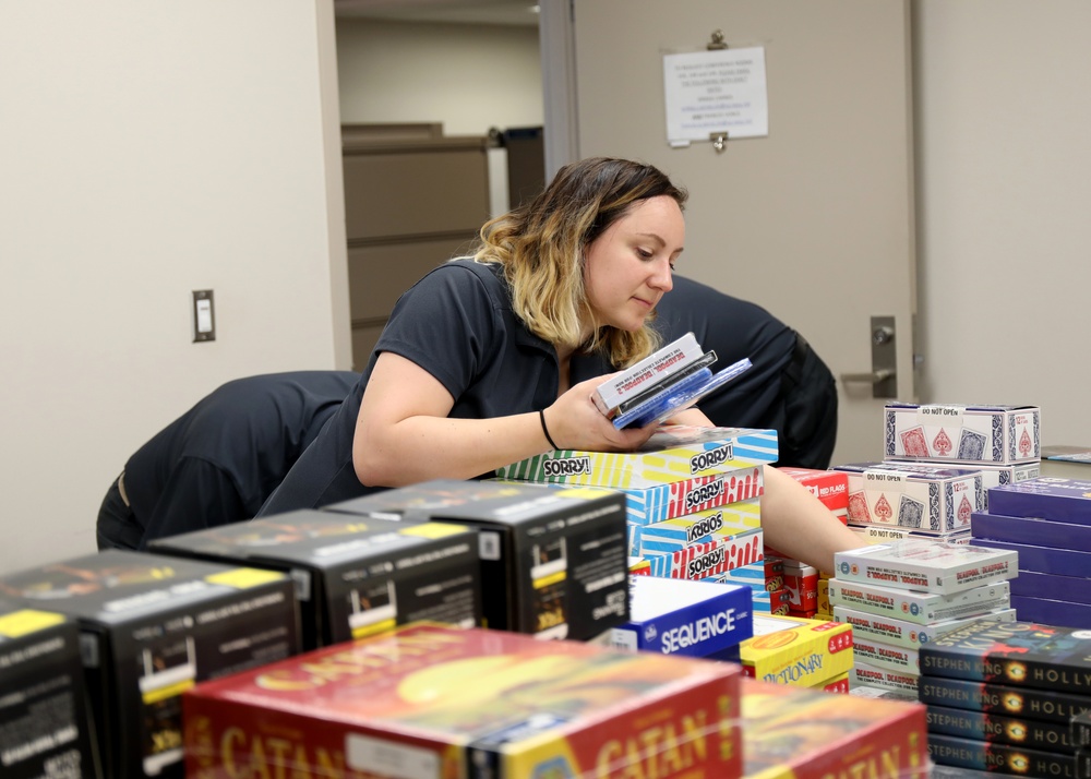 Military Sealift Command Resiliency Team Delivers Crew Care Package to USNS William McLean