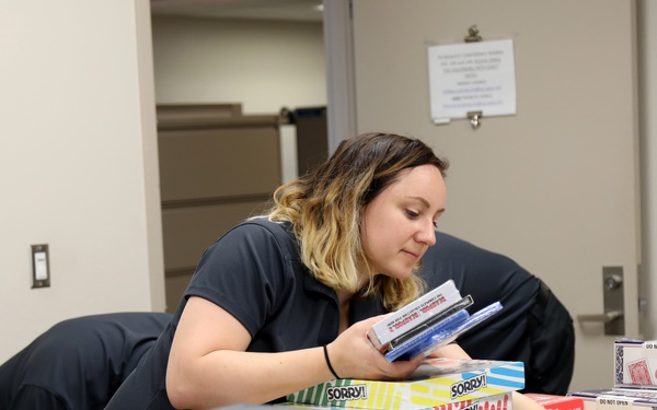 Military Sealift Command Resiliency Team Delivers Crew Care Package to USNS William McLean