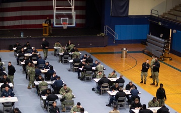 USS Ronald Reagan (CVN 76) Sailors take Navy-wide E-7 advancement exam