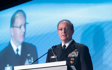 Admiral Stuart Munsch speaks at the SNA 2025