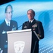 Admiral Stuart Munsch speaks at the SNA 2025