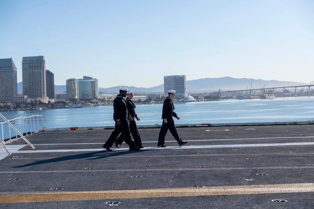 Nimitz Sailors Transit the Flight Deck