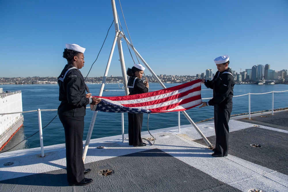 Nimitz Sailors Fold the Ensign