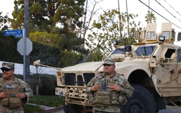 Cal Guard's 330th and 670th Military Police stand watch as the sun sets in LA