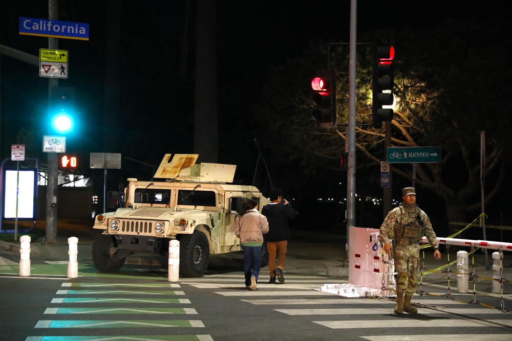 330th and 670th Military Police Companies Maintain Security Near the LA Wildfires As The Sun Sets