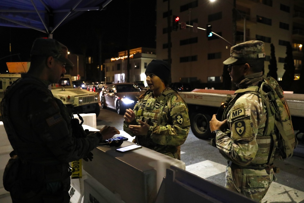 330th and 670th Military Police Companies Maintain Security Near the LA Wildfires As The Sun Sets