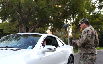 330th and 670th Military Police Companies Maintain Security Near the LA Wildfires As The Sun Sets