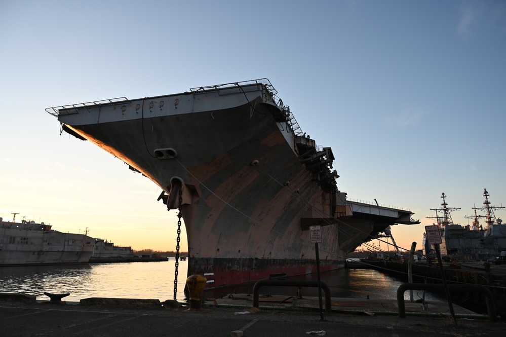 Ex-USS John F. Kennedy Embarks on Final Journey from the City Where the Navy Began