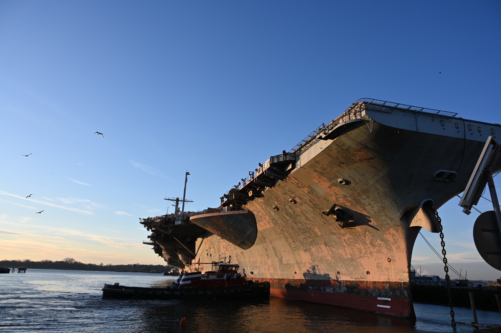 Ex-USS John F. Kennedy Embarks on Final Journey from the City Where the Navy Began