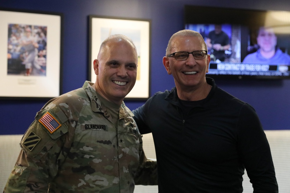 Brig. Gen. Leland Blanchard Poses for Photo with Robert Irvine While Visiting National Guard Service Members Preparing to Support 60th Presidential Inauguration