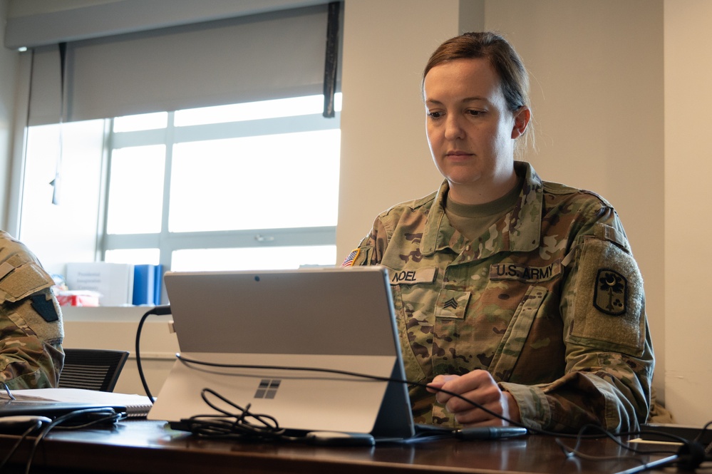 Soldier Helps Credential National Guardsmen Preparing to Support 60th Presidential Inauguration