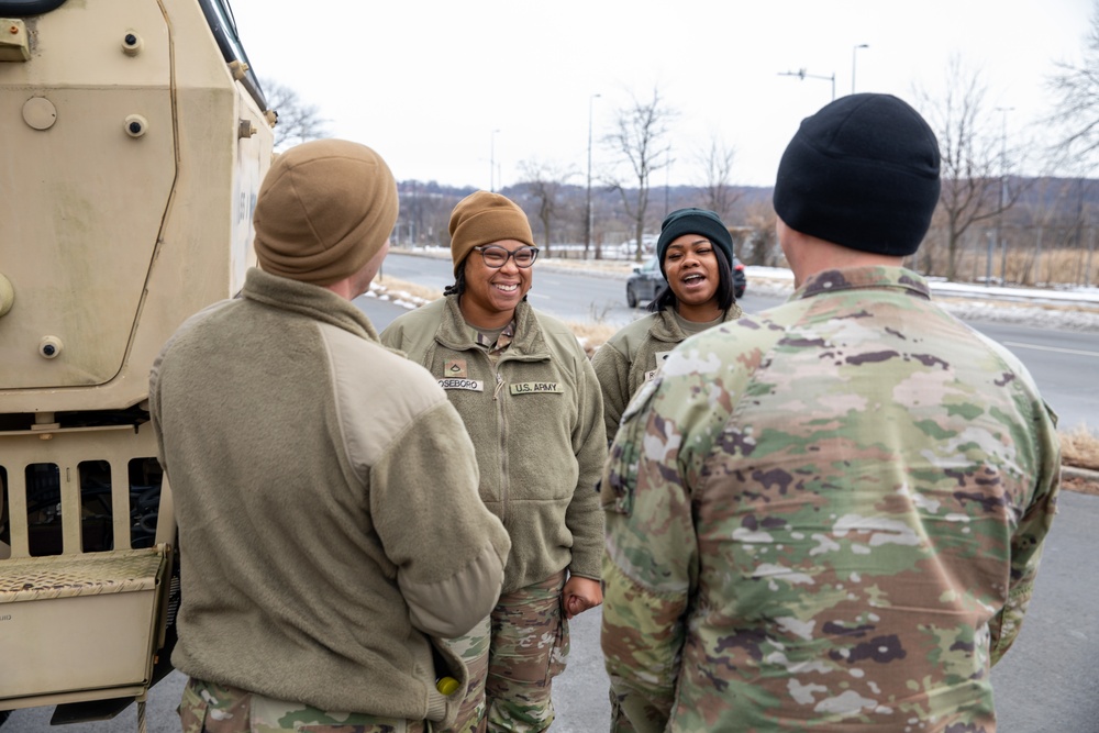 U.S. Army Soldiers from Joint Task Force District of Columbia Share a Laugh at D.C. Armory