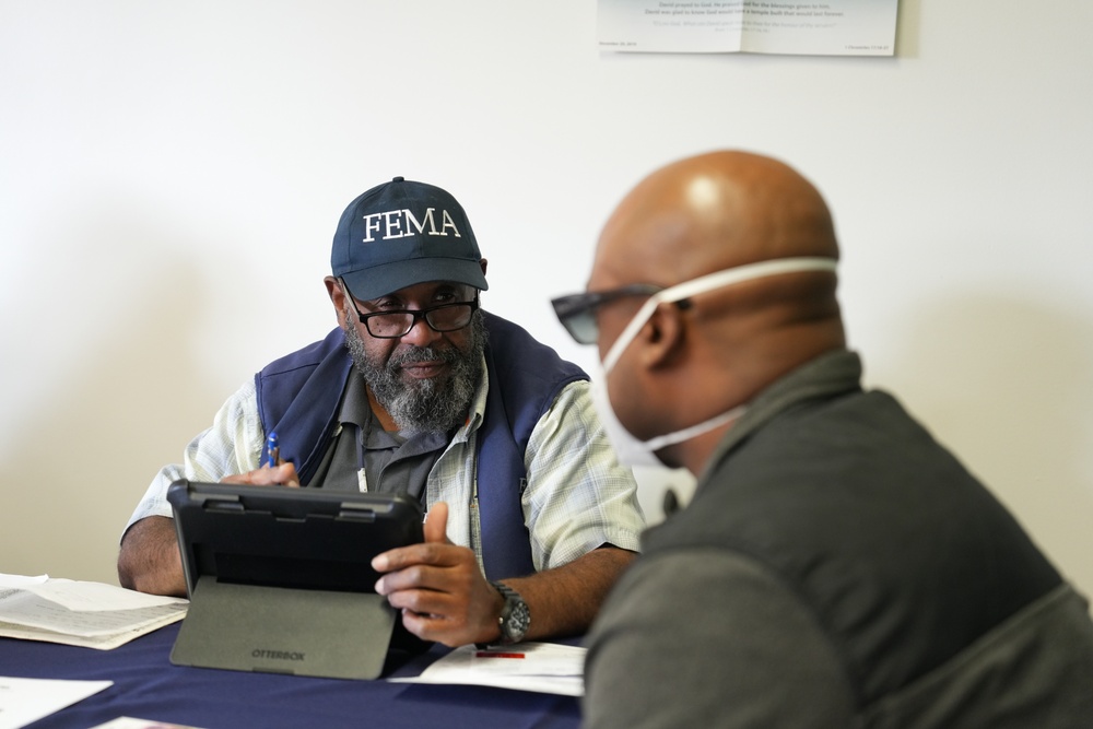 FEMA Disaster Survivor Assistance teams register survivors at a free legal services event at First AME Church Pasadena