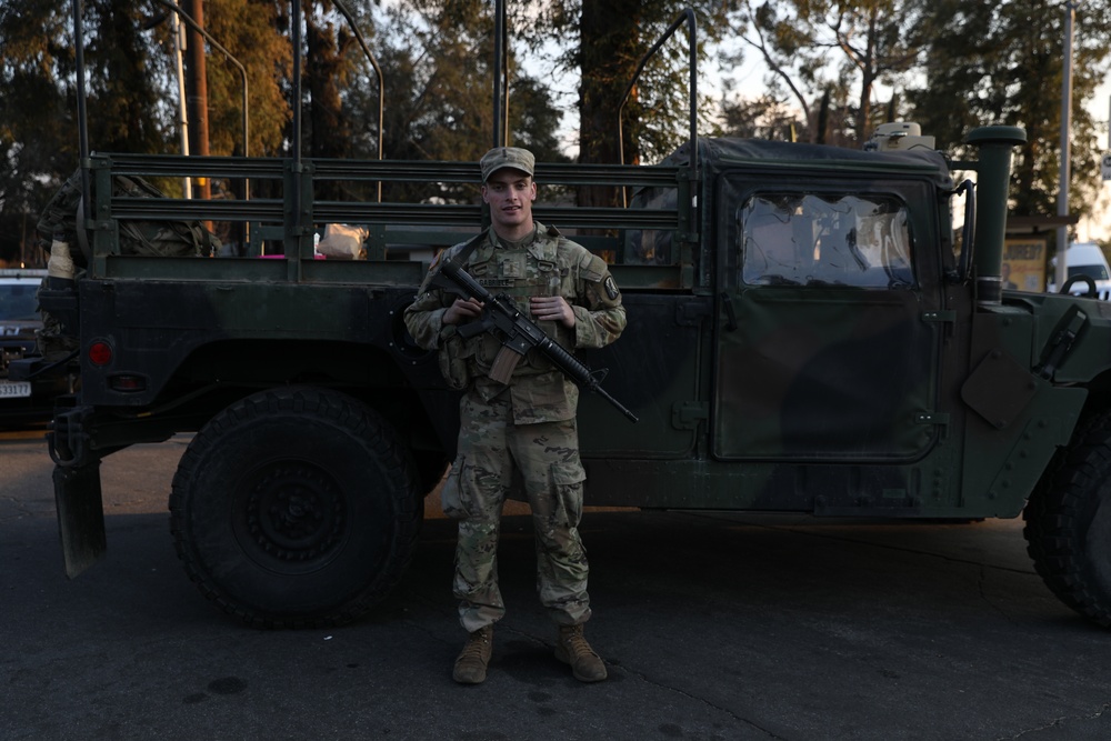 1st Battalion,143rd Field Artillery Regiment Soldiers guard TCPs with local law enforcement