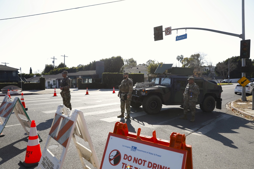 The 870th and 670th MP Company assist local law enforcement at Traffic Control Points