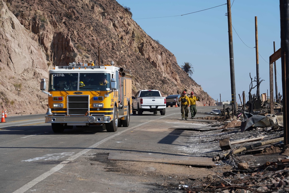 Cal Fire, California Task Force 3 and Ejercito Mexicano Rescate respond to the Palisades wildfire in California.