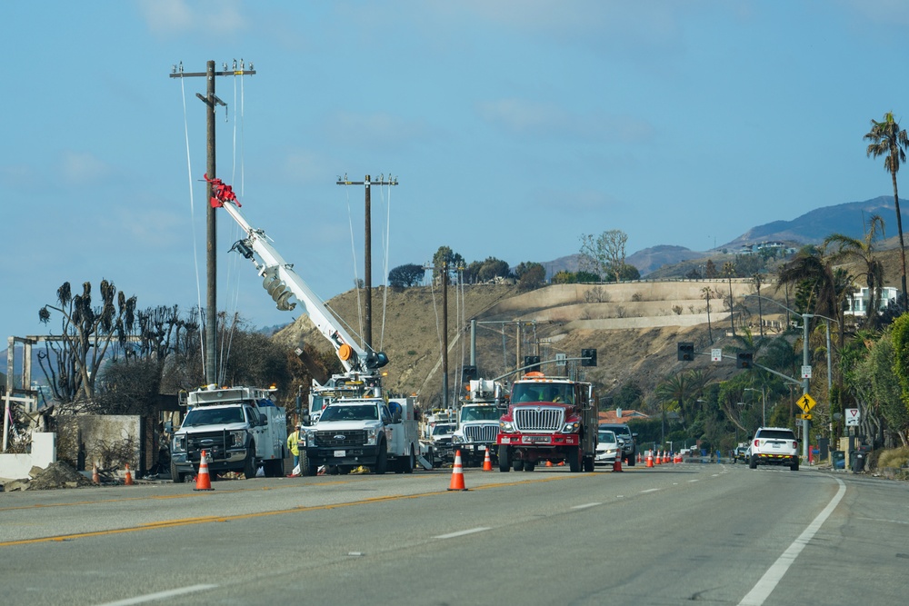 Crews work to restore power in the Palisades after the wildfires