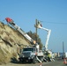 Crews work to restore power in the Palisades after the wildfires