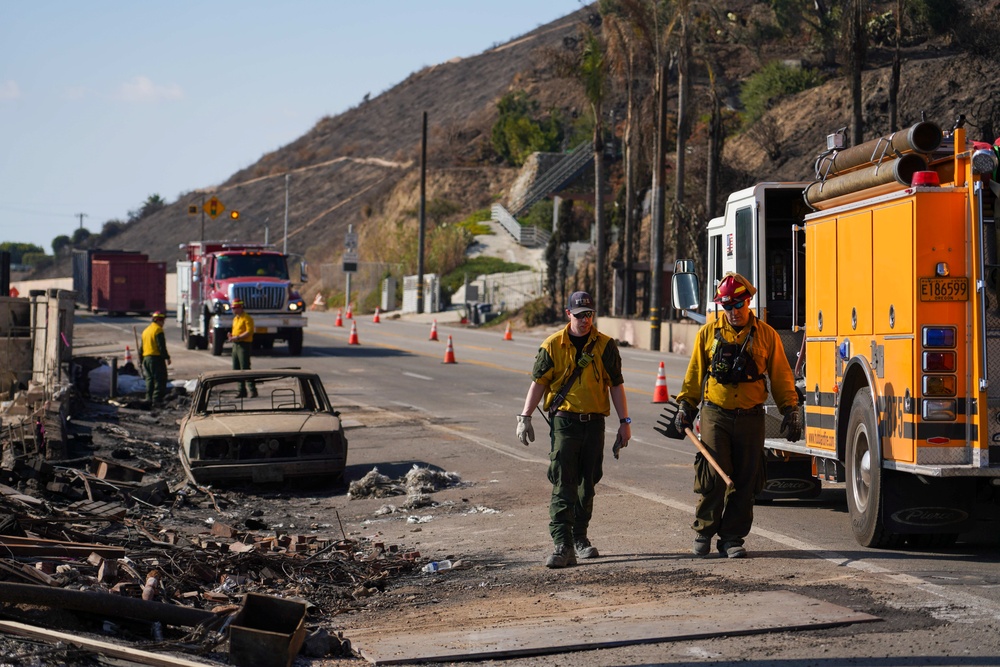 Cal Fire, California Task Force 3 and Ejercito Mexicano Rescate respond to the Palisades wildfire in California.