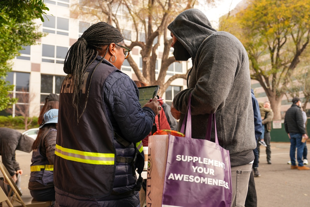 FEMA Disaster Survivor Assistance team and volunteers assist wildfire survivors at the Run with Us community event in Pasadena, California