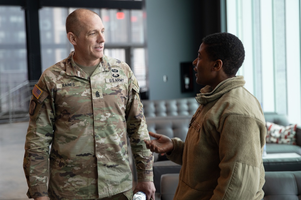 Senior Enlisted Advisor to the Chief of the National Guard Bureau John Raines III, talks with Senior Airman