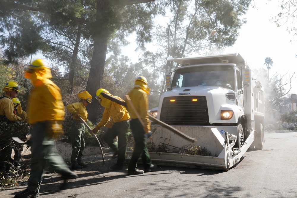 Fire Crew Clear Debris In Communities Impacted By Eaton Fire