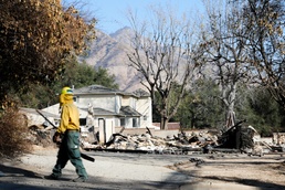California Army National Guard Fire Crew Works To Clear Debris At Communities Impacted By Eaton Fire