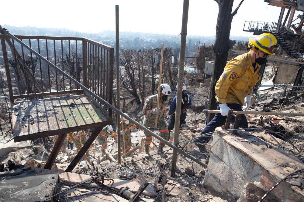 Search and Rescue teams perform search mission in Pacific Palisades