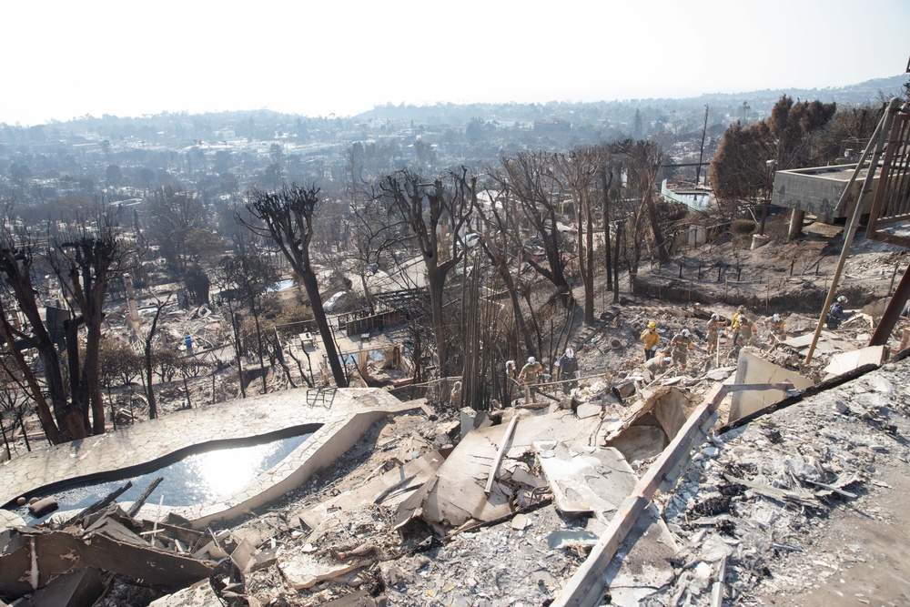 Search and Rescue teams perform search mission in Pacific Palisades