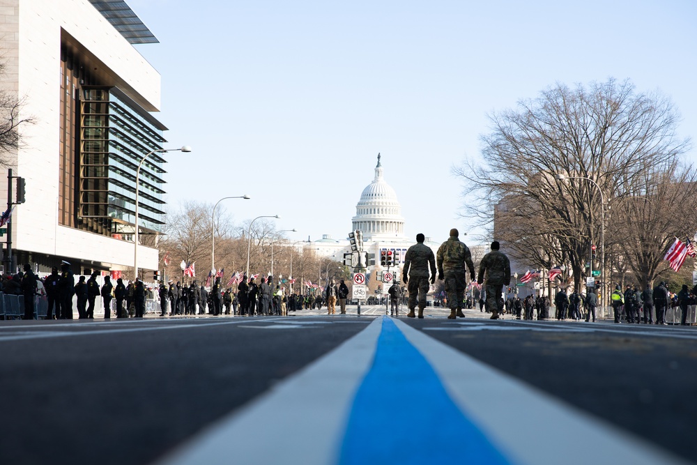 National Guard Soldiers Patrol Pennsylvania Avenue Ahead of 60th Presidential Inauguration Motorcade