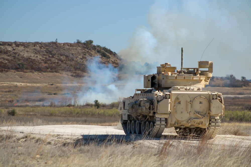 M2A3 Bradley Fighting Vehicle engages targets during 3ABCT/1CD CALFEX