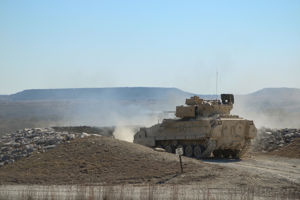 M2A3 Bradley Fighting Vehicle engages targets during 3ABCT/1CD CALFEX